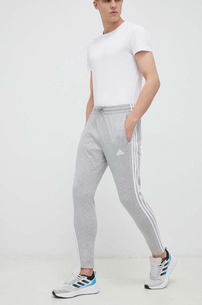 Штани для тренувань adidas Essentials колір сірий меланж